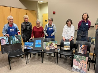 Arkansas Pastel Society members with work completed during Nancie King Mertz's worksohp
